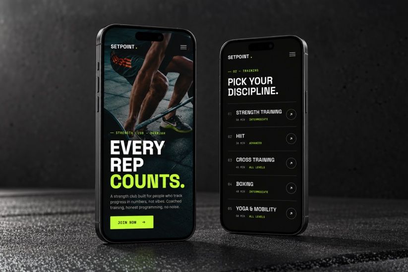 Setpoint's website on two phones on dark concrete: Every Rep Counts, and a list of training disciplines.